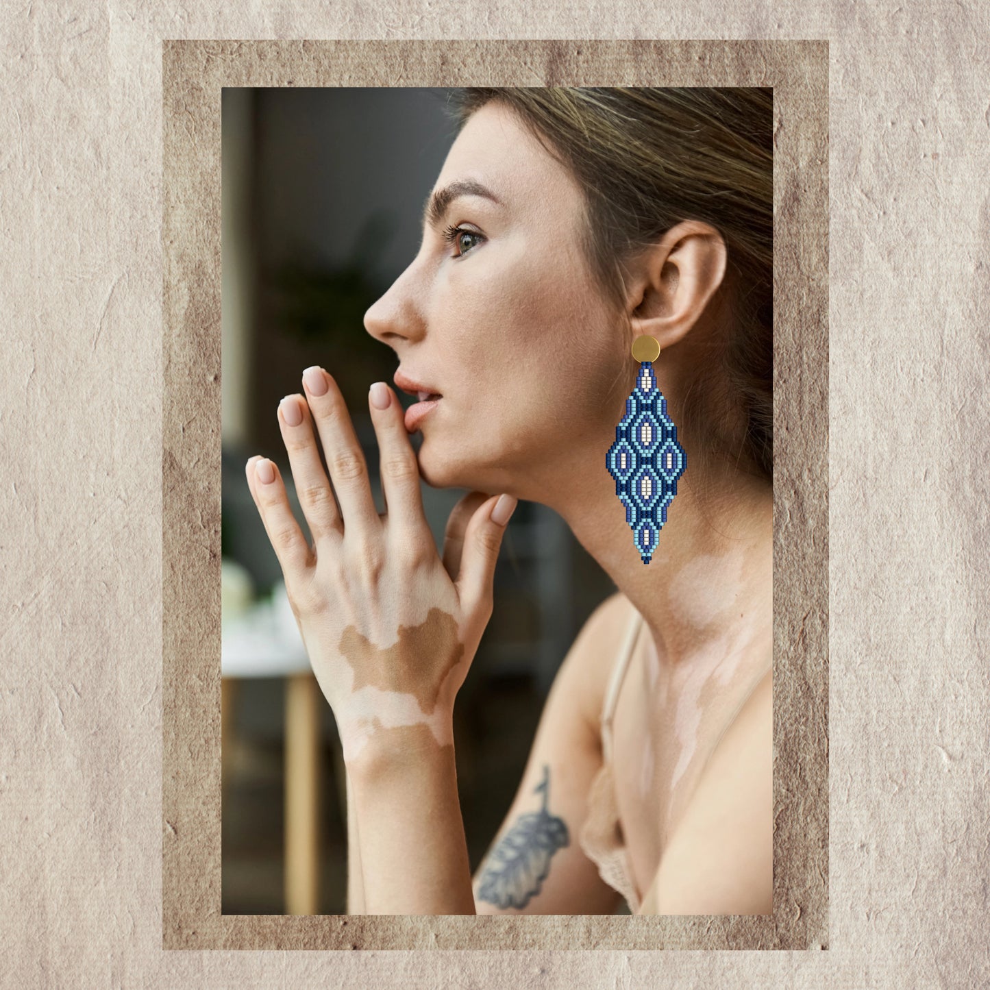 Woman wearing blue earrings 