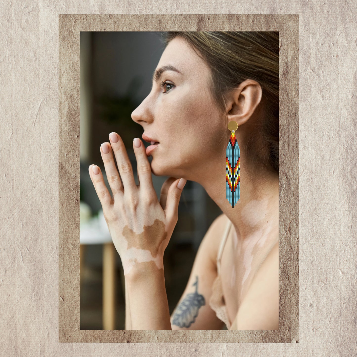 Woman wearing feather earrings