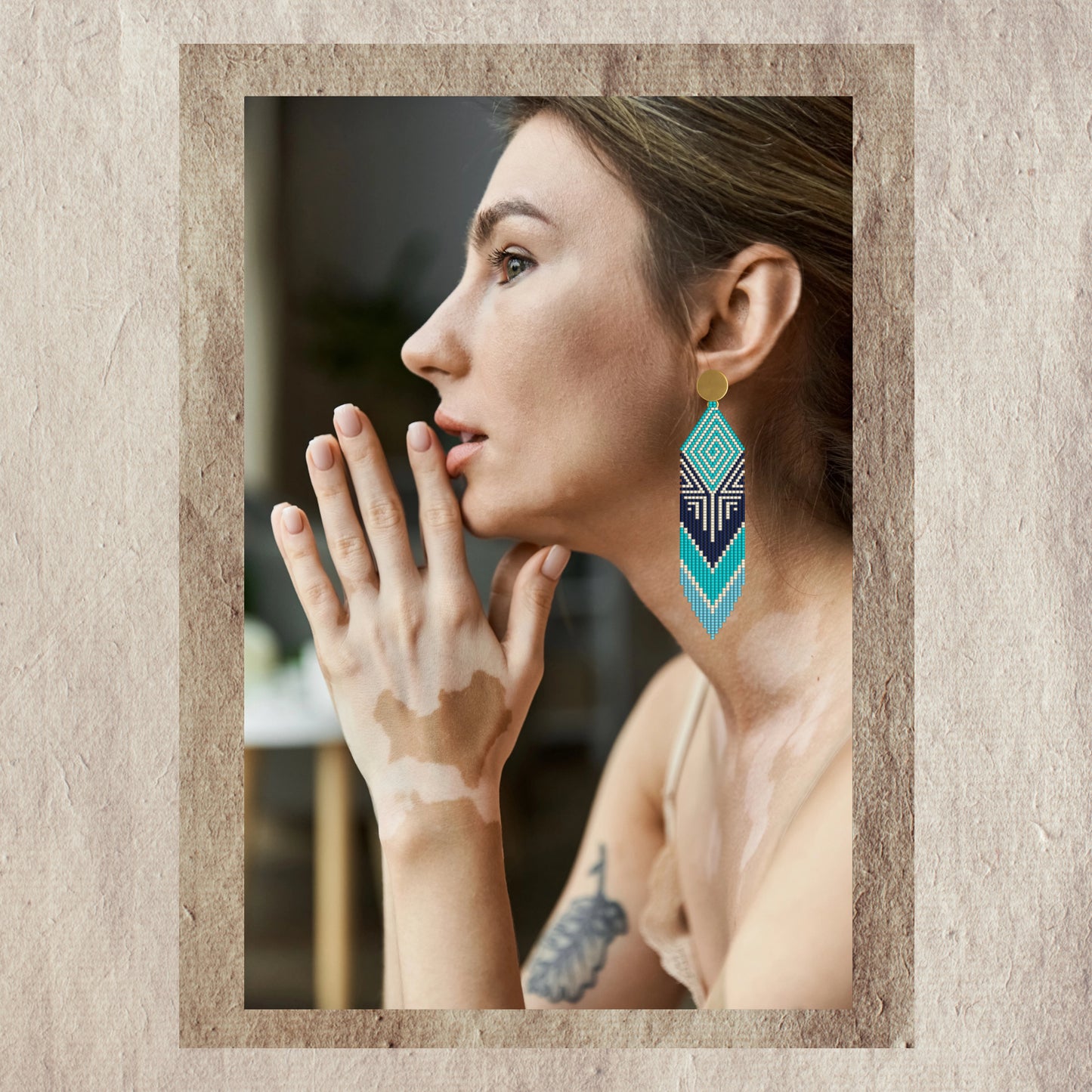 Woman wearing geometric earrings 