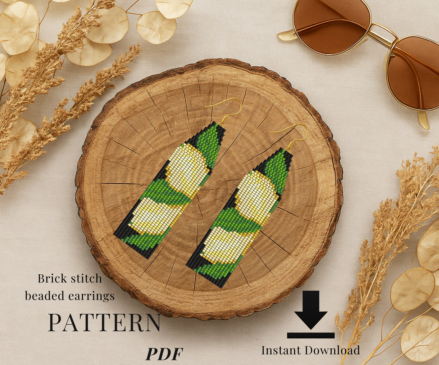 lemon Brick stitch beaded earrings on a wooden slice 