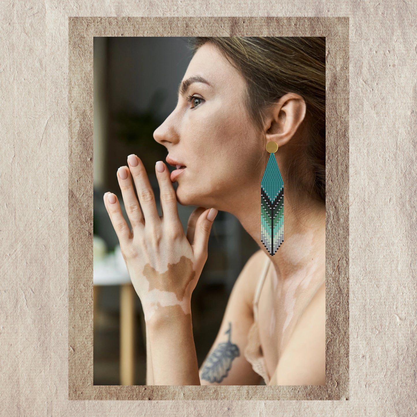 Woman wearing a emerald earring 