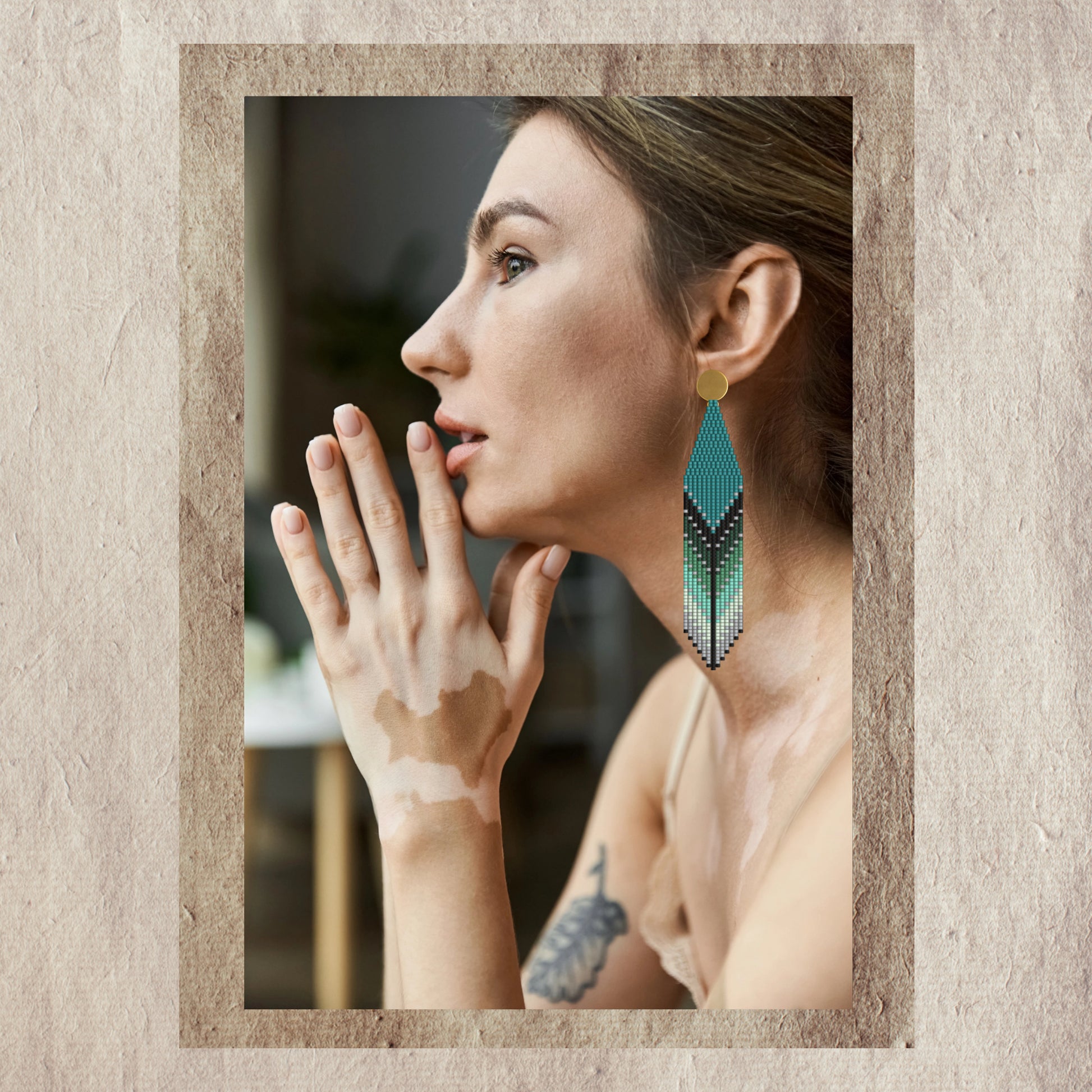 Woman wearing a emerald earring 