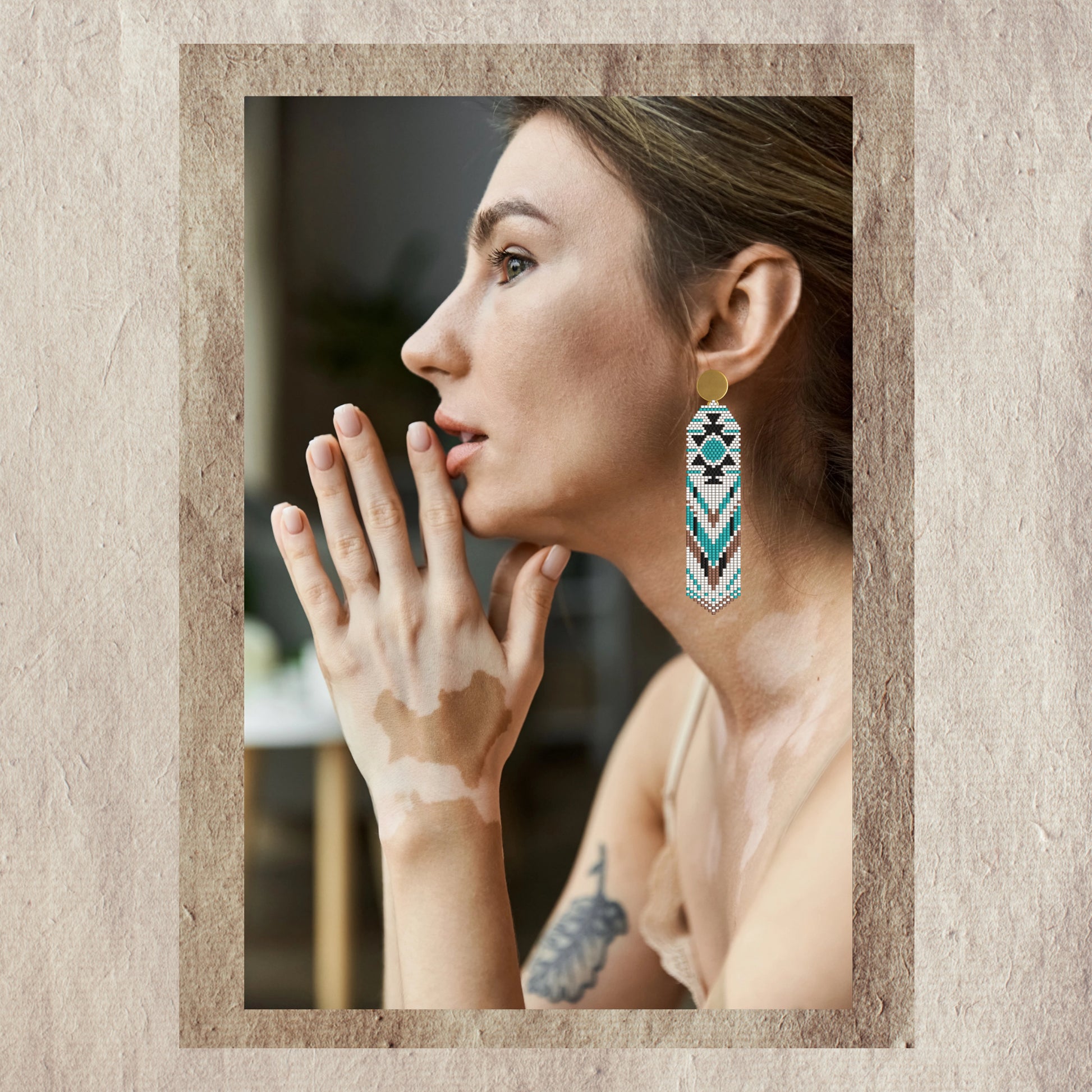 Woman wearing a pair of american earrings 