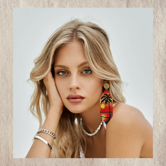 Woman wearing colorful  sunrise earrings with a neutral background